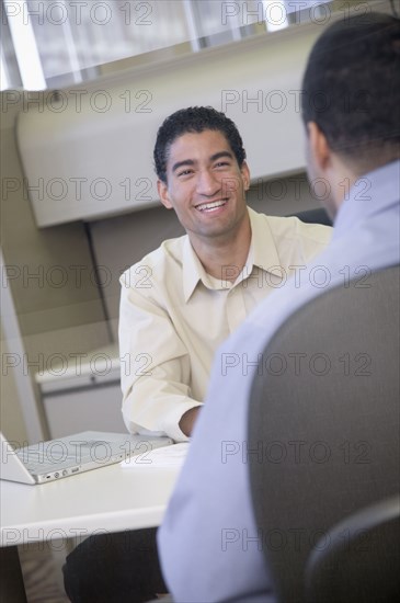 Two businessmen working in office