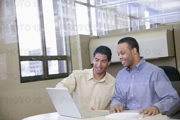 Two businessmen working in office