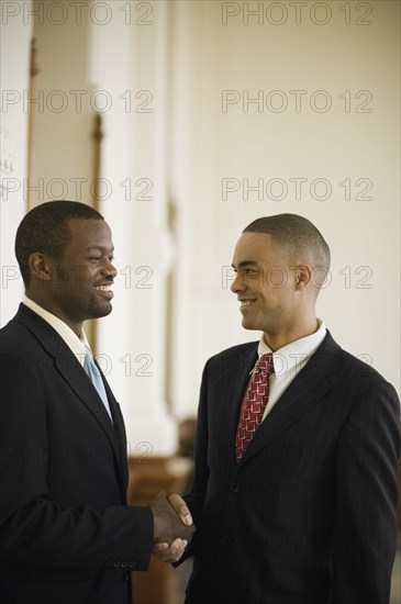 African businessmen shaking hands