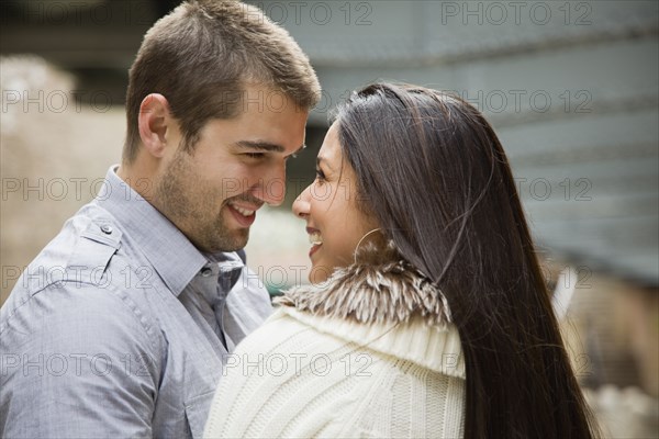 Couple smiling at each other