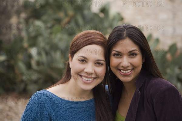 Woman smiling together