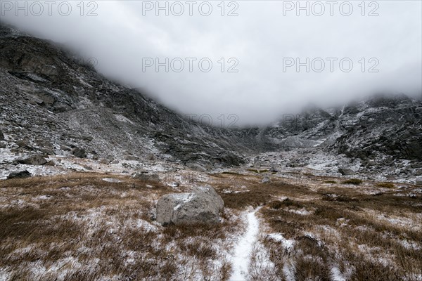 Clouds over rocky landscape