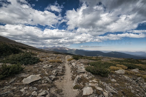 Clouds over rocky landscape