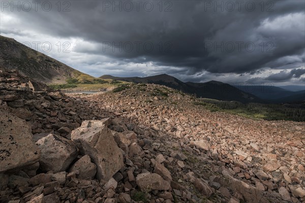 Clouds over rocky landscape