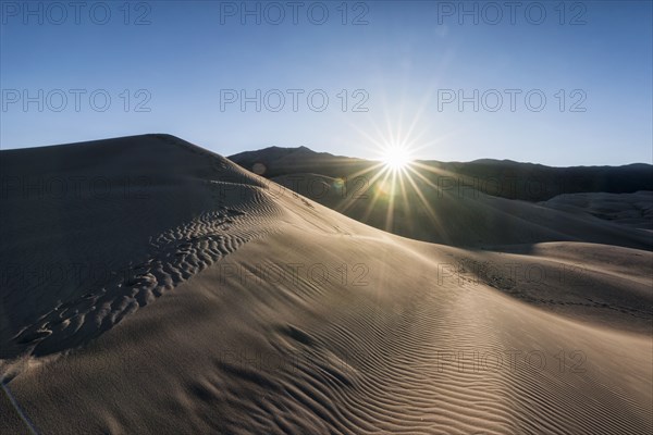 Sunbeams on sand dunes