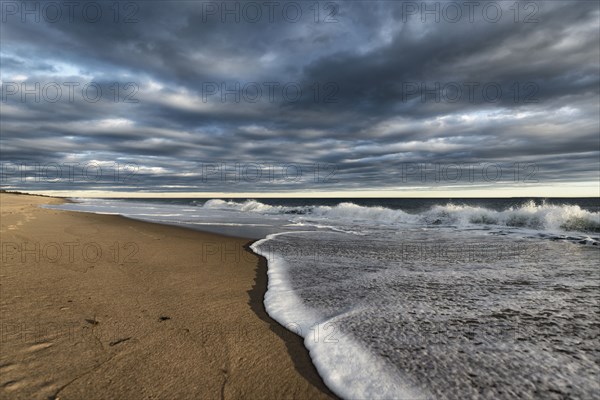 Clouds over ocean beach