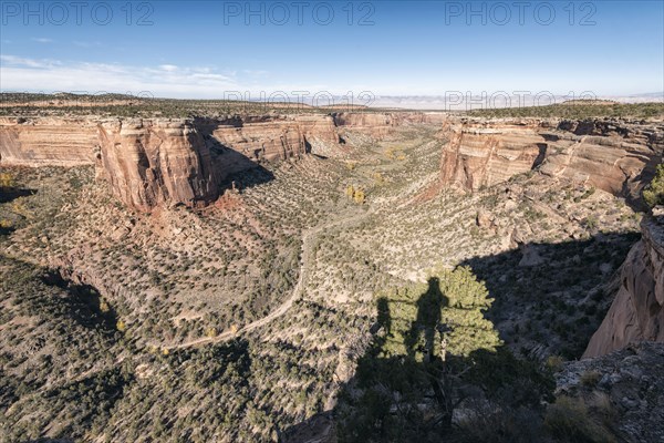 Shadow of person admiring scenic view of canyon