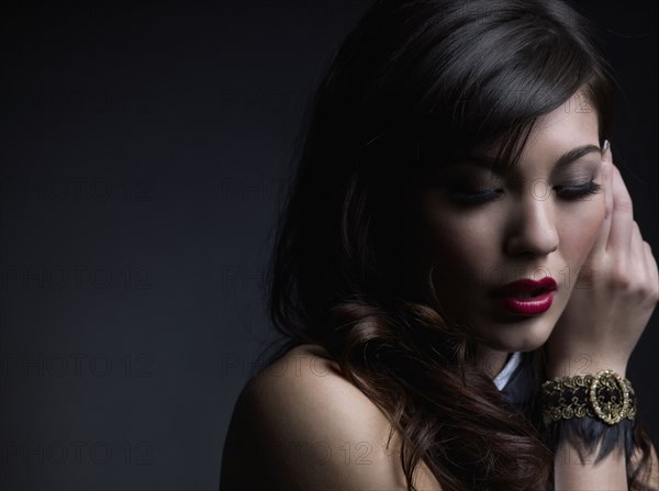 Mixed Race woman wearing bracelet