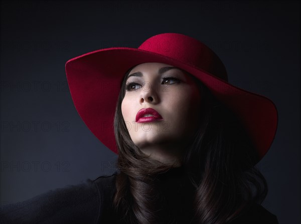 Mixed Race woman wearing hat