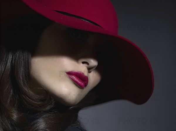 Mixed Race woman wearing hat