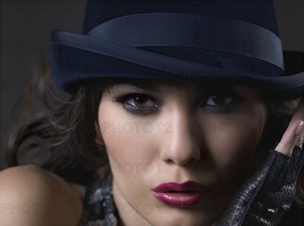 Mixed Race woman wearing hat