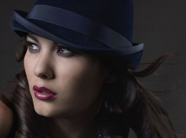 Mixed Race woman wearing hat