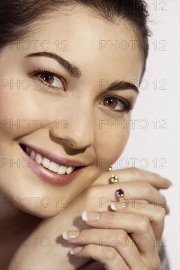 Close up of Mixed Race woman smiling
