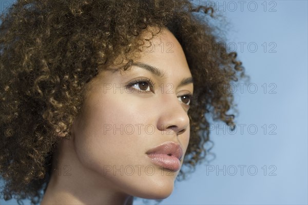 Mixed Race woman with curly hair