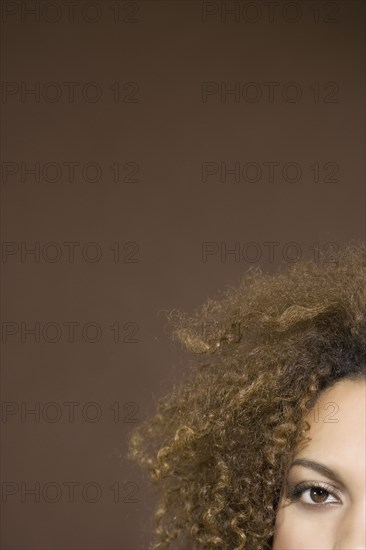 Mixed Race woman with curly hair