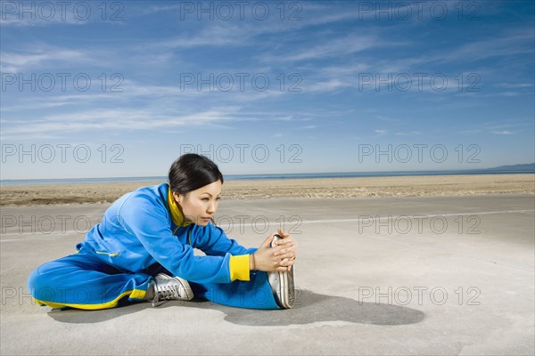 Asian woman stretching