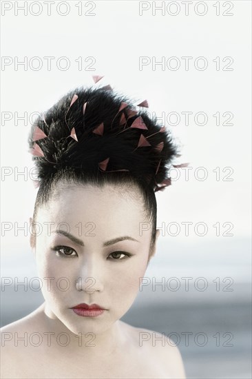 Asian woman with hair up