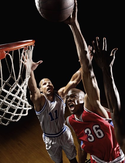 African basketball player scoring