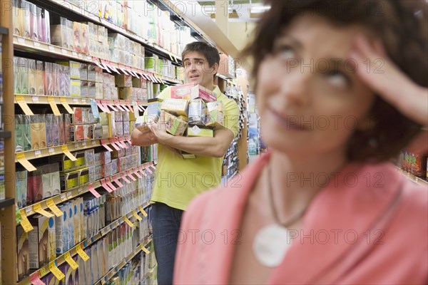 Couple shopping at grocery store