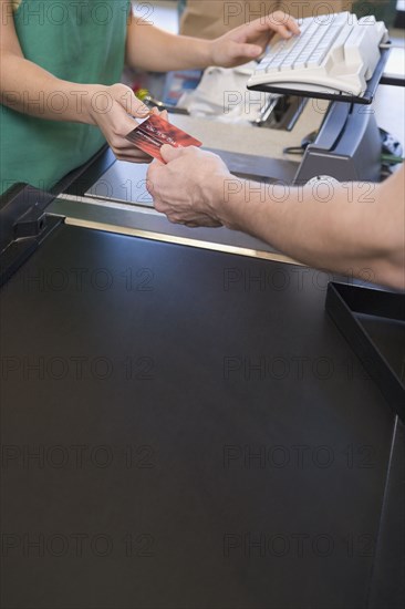 Man paying for groceries