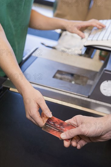 Man paying for groceries