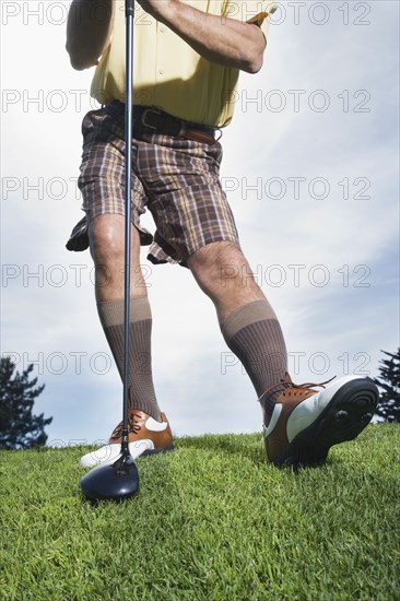 Man holding golf club