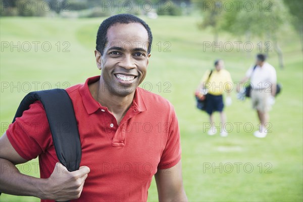 African man on golf course