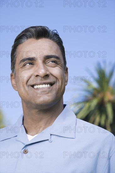 Hispanic man looking sideways