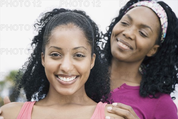 African mother smiling at daughter