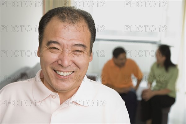 Chinese man laughing