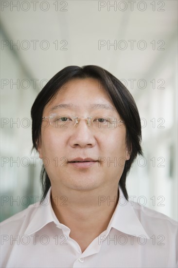 Chinese man wearing eyeglasses