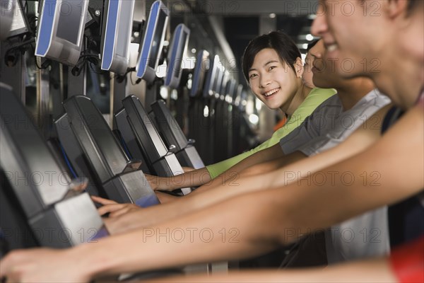 Chinese people using exercise equipment