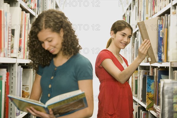 Girls enjoying library