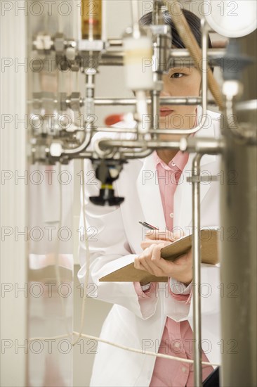 Chinese scientist checking gauge