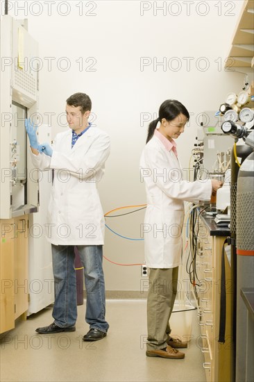 Scientists working in laboratory