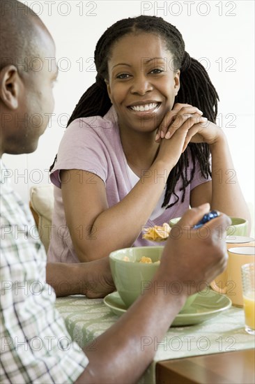 African American family eating breakfast