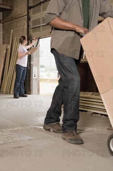 People working in warehouse