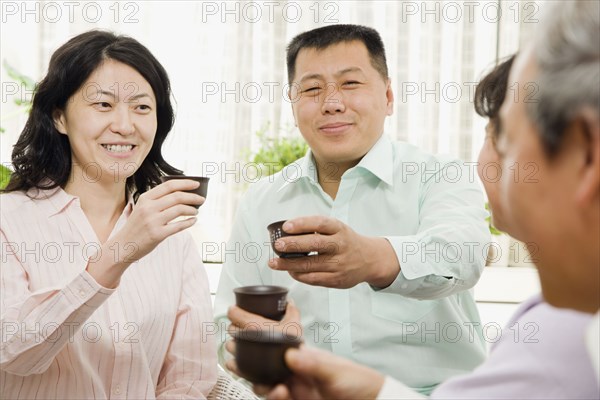 Chinese family drinking tea