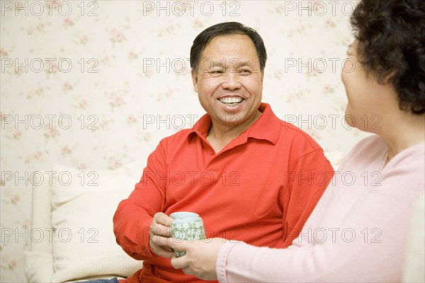 Chinese couple drinking tea