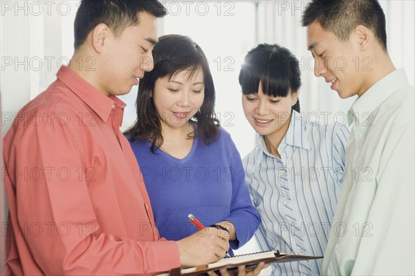 Chinese business people working together