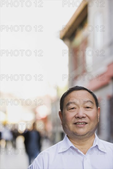 Chinese man on city street