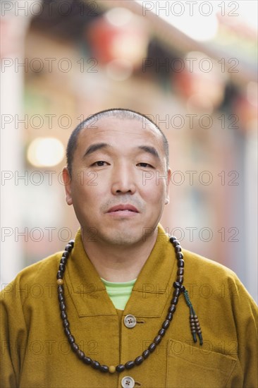 Chinese man looking serious