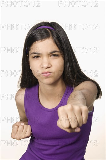 Hispanic girl in fighting stance