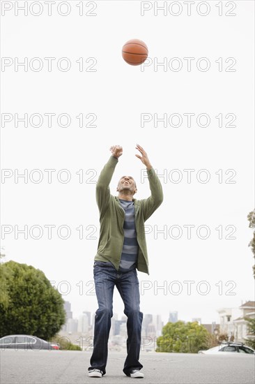 African American man playing basketball