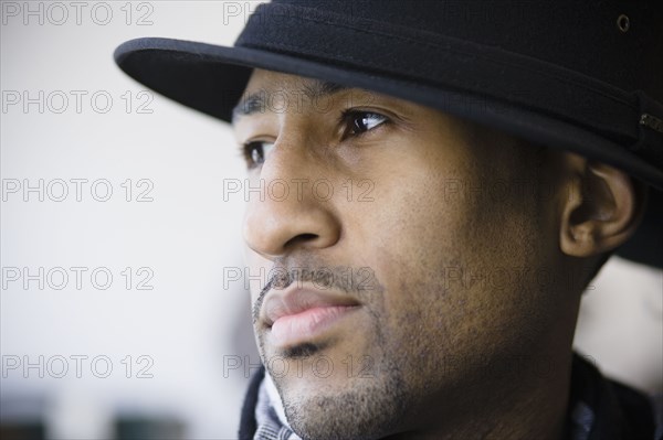 African American man wearing fedora