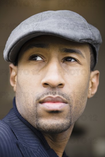 African American man wearing cap