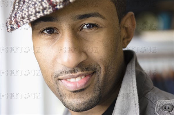 African American man wearing cap