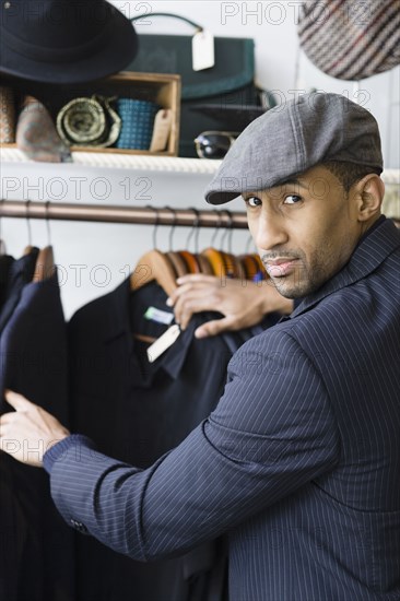 African American man shopping for clothing