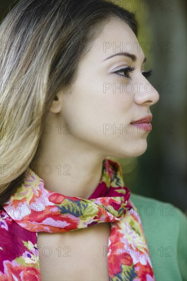 Hispanic woman in colorful scarf
