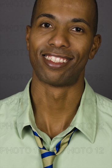 Smiling African American man wearing braces